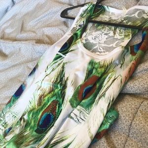 White peacock feather dress..lace and rhinestones.